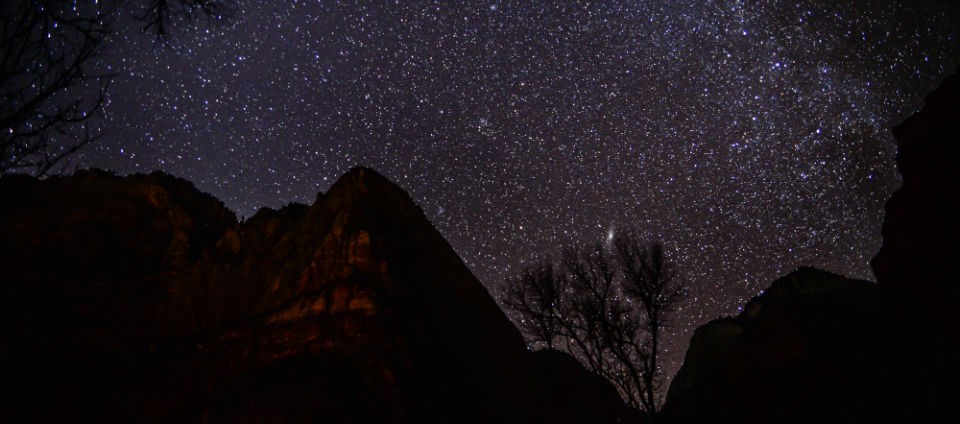 A starry sky above Lady Mountain, as seen from the Zion Lodge