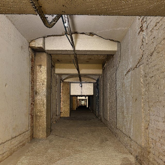 3D render of subterranean white brick corridor