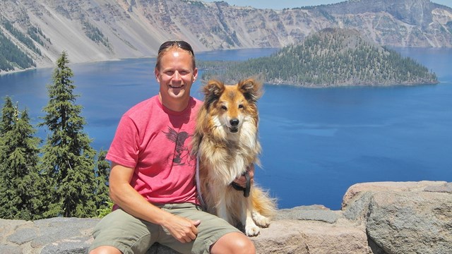 Visitor with his dog at Rim Village