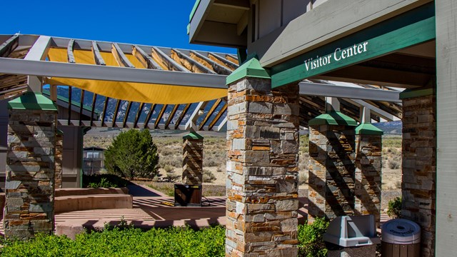 Brown and green visitor center entrance