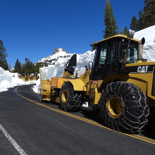 A rotary snow plow clears snow from Lassen National Park Highway