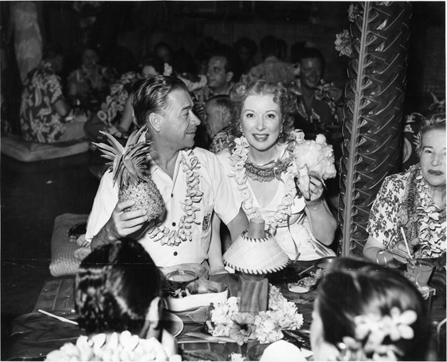 Man and woman sitting at table